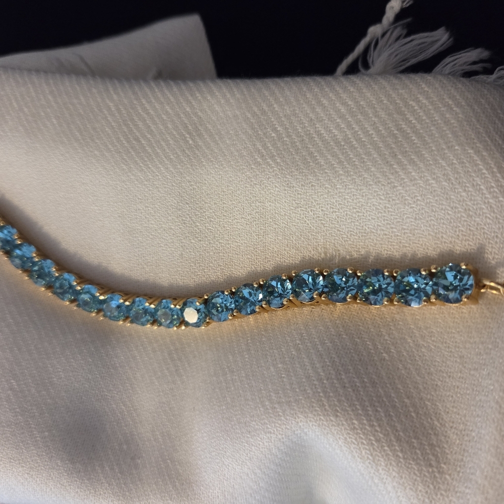 Park Lane Limited Edition Gold Tennis Bracelet with TEAL Crystal Stones